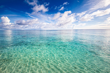 Tropical beach and ocean as a background. Azure water, summer seascape. Exotic seascape