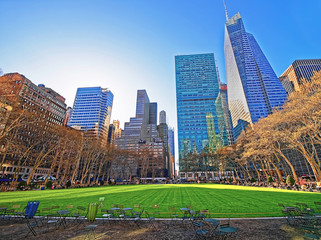 Tables and chairs and Skyscrapers viewed from Bryant Park