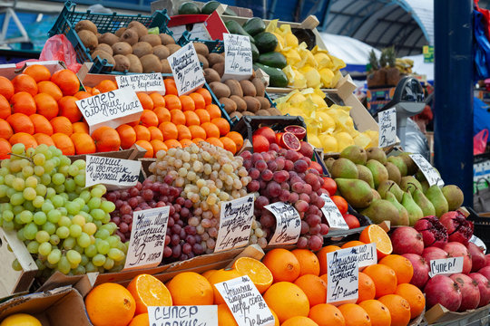 Fruit market with various colorful fresh fruits and vegetables. Healthy food concept. Vitamins and minerals.