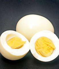 Cooked eggs surrounded by black background