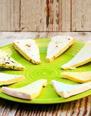 Cheese surrounded by rustic background