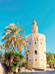 Fototapeta na wymiar Tower of gold in Seville in the south of Spain in a sunny day. It´s atraction for the tourist.