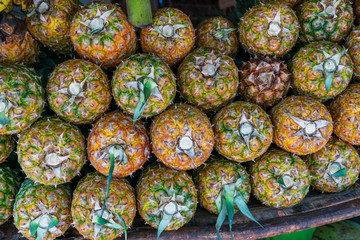 Pineapple stack at shop outdoor