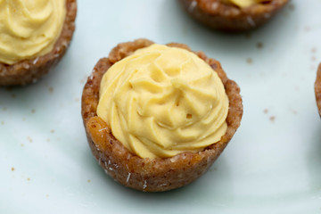 Mini raw vegan brioche with lemon and mint, a healthy and tasty dessert