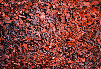 Dense red sawdust texture background