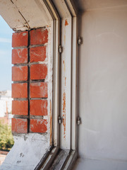 Old dirt rotten wooden retro white window