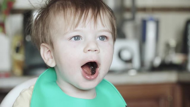 Boy eats hematogen