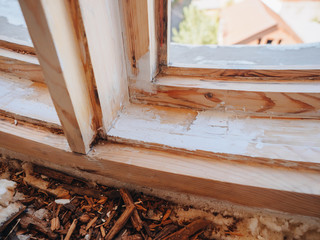 Old white wooden window restoration renovation recovery