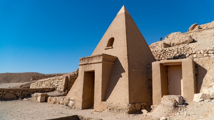 Luxor, Egypt: Deir el-Medina,is an ancient Egyptian village which was home to the artisans who worked on the tombs in the Valley of the Kings of the New Kingdom of Egypt.