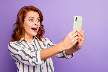 Portrait of cheerful positive woman fun on spring holidays make selfie enjoy video calling wear good look clothing isolated over violet color background