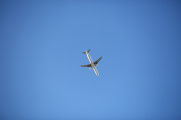 Jet plane flying in the blue sky