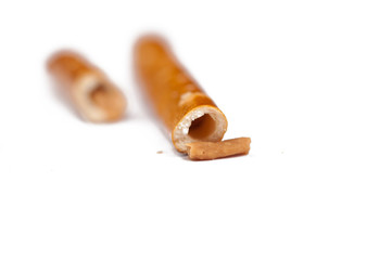 Salty cracker pretzel sticks isolated on white background.Copy space