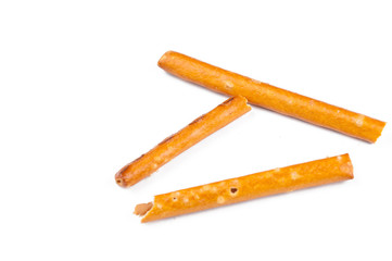 Salty cracker pretzel sticks isolated on white background.Copy space