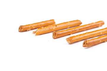 Salty cracker pretzel sticks isolated on white background.Copy space