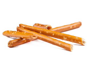 Salty cracker pretzel sticks isolated on white background.Copy space