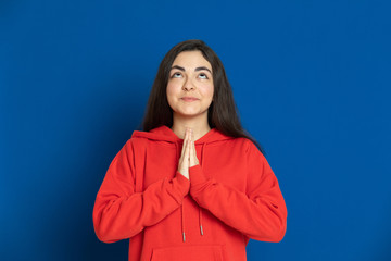 Brunette young girl with a red jersey