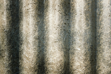 close up shot of a scratched plastic wall with a lot of contrast, natural lighting and accurate...