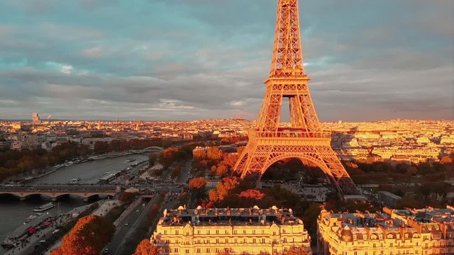 Aerial close up view of Paris Eiffel Tower Tour de Eiffel and panoramic view over Seine River and Paris city attractions at sunset 