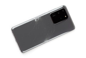 Smartphone with a broken back cover on a white background.