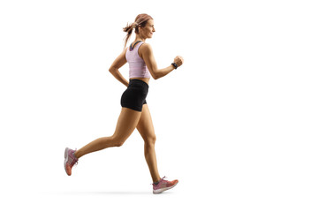 Fototapeta na wymiar Strong fit muscular woman jogging