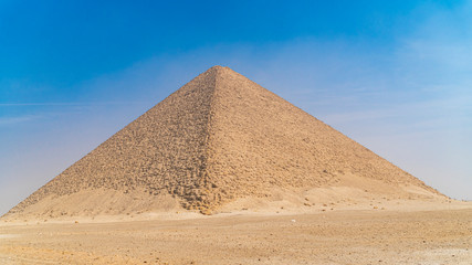 Fototapeta na wymiar Red Pyramid. The Red Pyramid, also called the North Pyramid, is the largest of the three major pyramids located at the Dahshur necropolis in Cairo, Egypt.