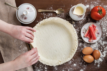 Person preparing the raw dough to be filled with the necessary ingredients to cook a healthy recipe...
