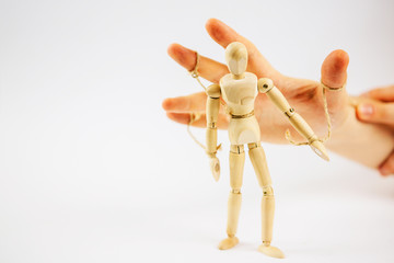 Manipulative Person.Eerie puppeteer hands controlling you.