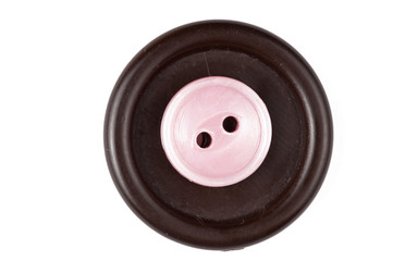 Clothes button isolated on white background. Copy space