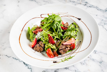 salad with strawberries and duck liver