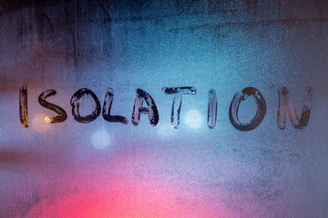 the word isolation handwritten on wet window glass at night - close-up full frame picture with selective focus - obrazy, fototapety, plakaty