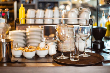 empty flutes and cups in the restaurant