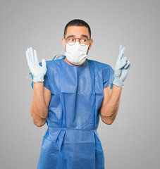 Coronavirus.Young man doing concepts and wearing mask and protective gloves