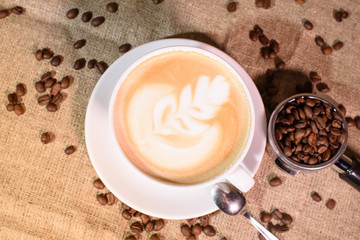 Tasty fragrant caupchino on a canvas background. Near the Turk and the holder.