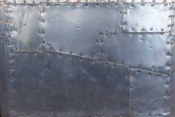 Metal panel with screws. Metal texture, metal background.