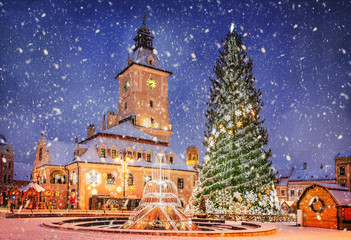 Christmas market and decorations tree in center of Brasov town, Transylvania, Romania