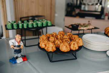 Beautifully decorated catering banquet table with different food snacks and appetizers on corporate christmas birthday party event or wedding celebration