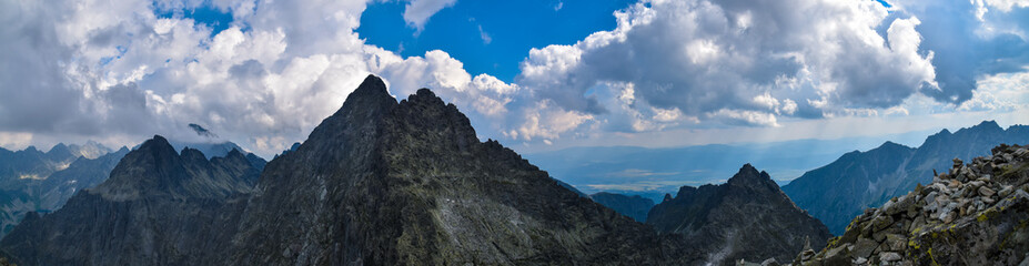 Fototapeta na wymiar panorama of rocky mountains in summer
