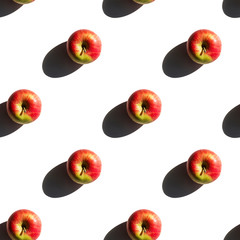 Seamless apples pattern. Creative food on white background. Fresh season fruit texture with strong shadows