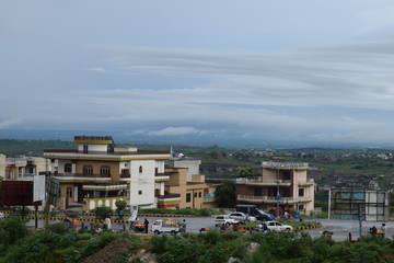 City view after rain with cloudy sky 