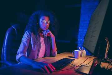 Profile photo of workaholic dark skin programmer lady look screen monitor check debugging system...