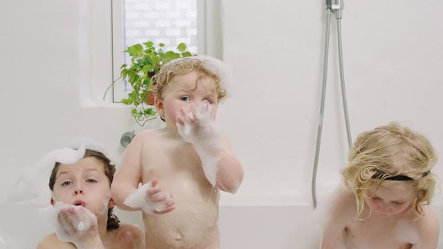 bathtime girls bath time - little girl (3 years) bathing in bathroom Stock ...