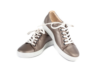 Shinny Brown Leather Sneakers With White Lace Isolated on White