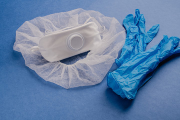 Protective equipment against the virus: mask, respirator, disposable gloves, cap
