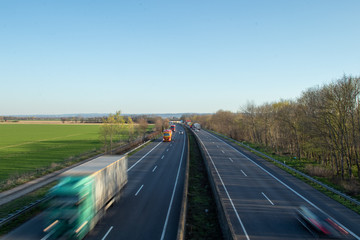 germany highway with two lines, many trucks