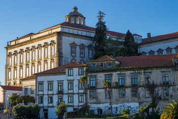 Obraz premium Iconic building of the city of Porto in Portugal seen from Vila Nova de Gaia on a sunny day