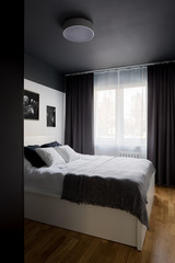 Bedroom with black ceiling