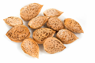 Almond seeds on a white background