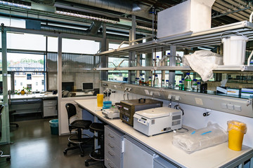 Centrifuges and other lab equipment on table