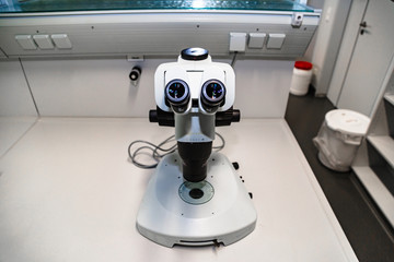 Laboratory microscope isolated on white close up