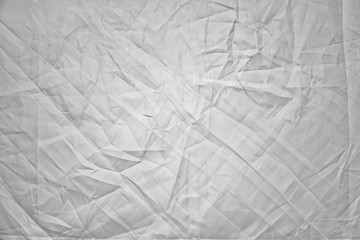 light background: Crumpled fabric, black and white, enhanced contrast